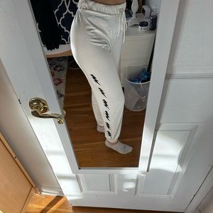 Super cute white and black lightening bolt sweatpants!